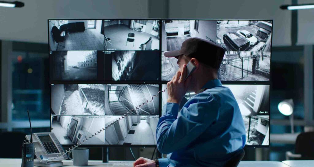 CCTV surveillance - professional security operator monitors
