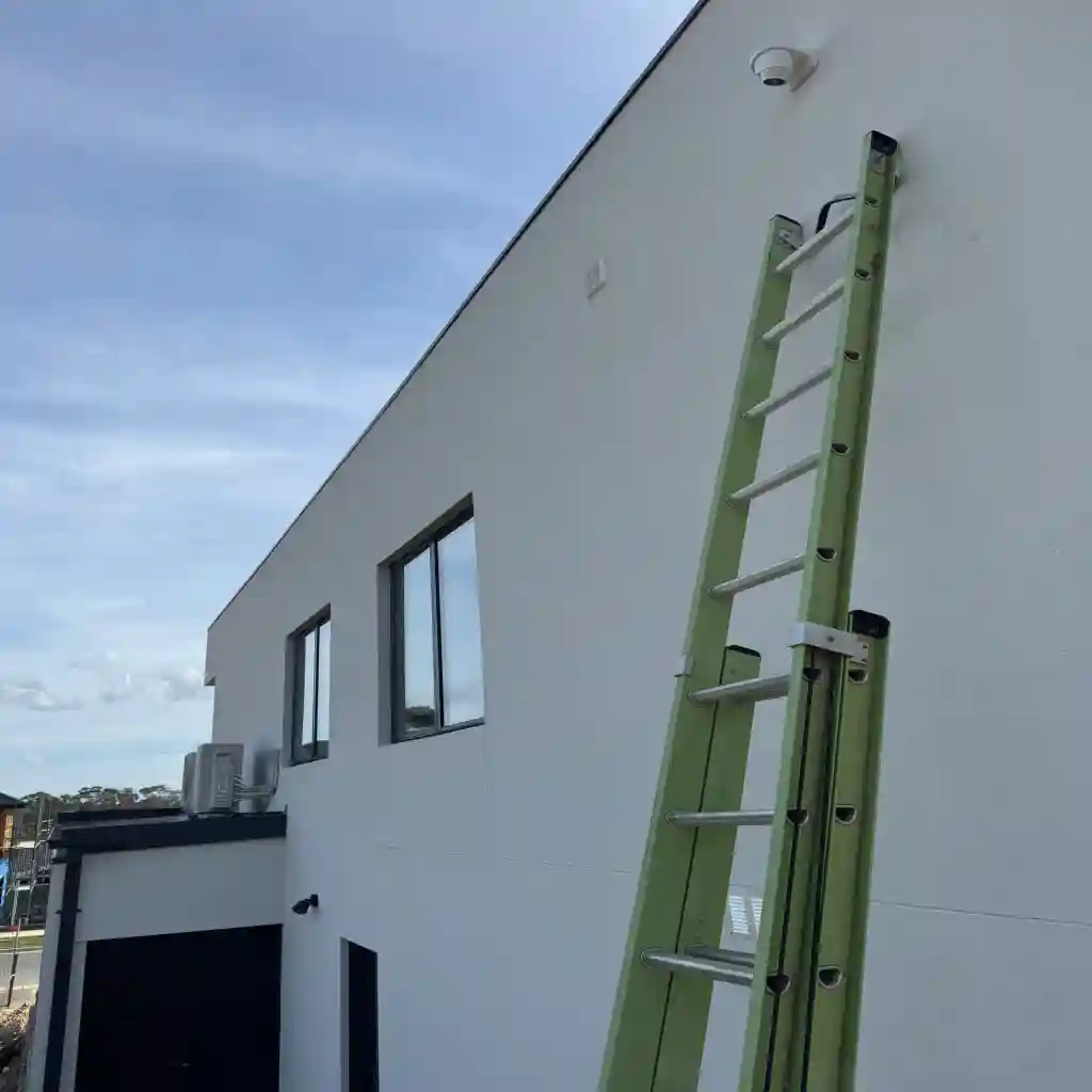 Camera fitted high on a Camberwell retail building