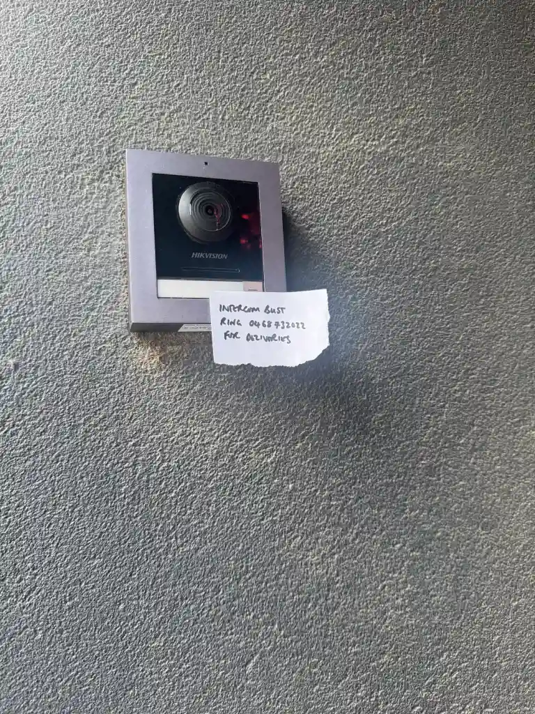 Hikvision IP video intercom outdoor station at a building entry